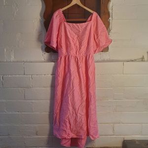 Pink puff sleeve open back dress